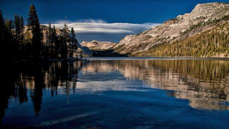 Serene Lake Reflections in Nature's Embrace wallpaper