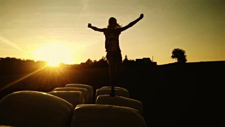 Joyful Leap into the Infinite Sky wallpaper