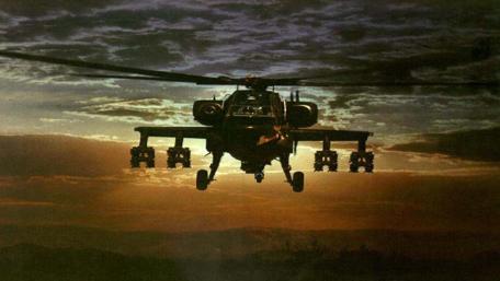 Helicopter Silhouette Against Dusky Skies wallpaper