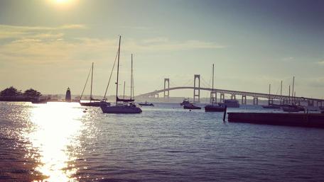 Serene Sunrise Over the Bay with Boats Morning Calmness Awaits wallpaper