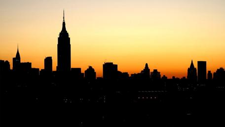 Majestic Sunset Over City Skyline wallpaper