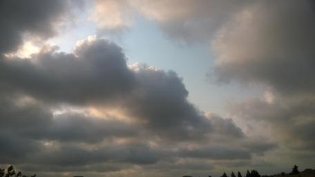 Majestic Clouds Over a Tranquil Sky wallpaper