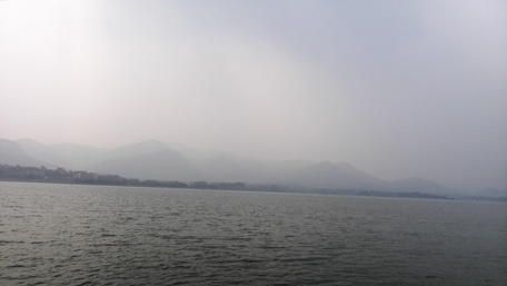 Misty Serenity Over Calm Waters wallpaper