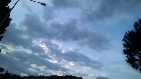 Serene Sky Over a Peaceful Town wallpaper