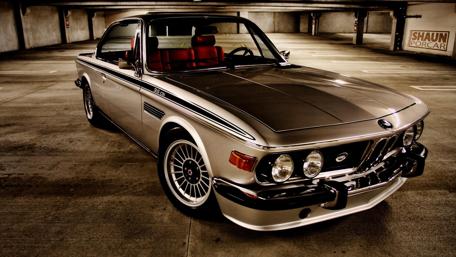 Vintage BMW Elegance in Underground Setting wallpaper