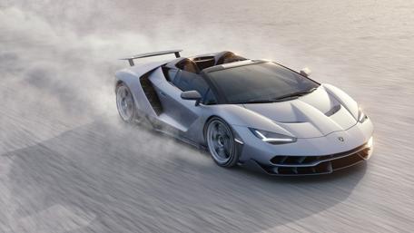 Sleek Silver Supercar in Action wallpaper