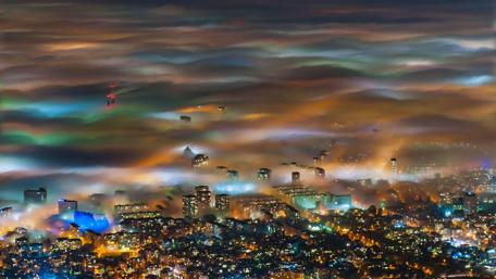 City Lights Beneath the Clouds wallpaper