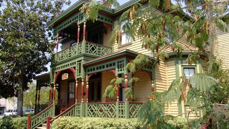 Charming Victorian Home Surrounded by Nature wallpaper
