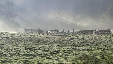 Serene Foggy Landscape in Rural Romania wallpaper