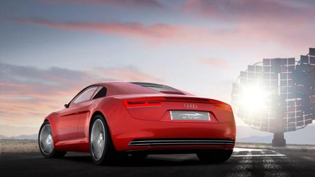 Sleek Audi e-tron Against a Stunning Sunset Scene wallpaper