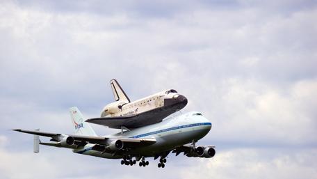 Space Shuttle in Flight Above Aircraft wallpaper