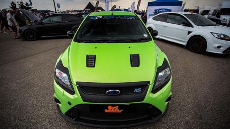Vibrant Green Car at a Car Show wallpaper
