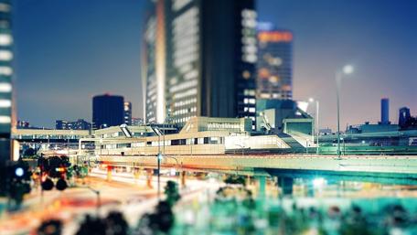 Urban Nightscape with Gleaming Lights and Motion wallpaper
