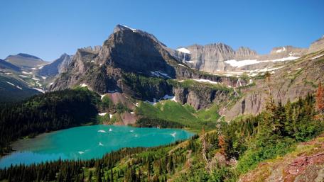 Serene Mountain Lake in Vibrant Nature Scene wallpaper