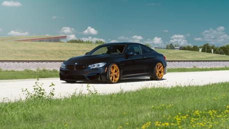 Sleek BMW with Eye-Catching Wheels for Car Enthusiasts wallpaper