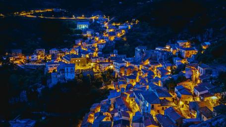 Luminous Cityscape Under Evening Sky wallpaper