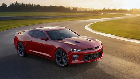 Sleek Red Sports Car on the Track wallpaper
