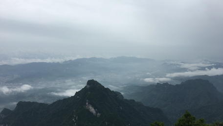 Majestic Mountain Panorama Under a Cloudy Sky wallpaper