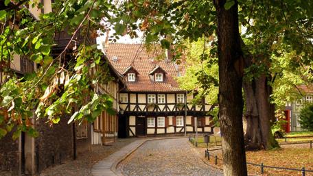 Charming Autumn Street in a Historic Town wallpaper