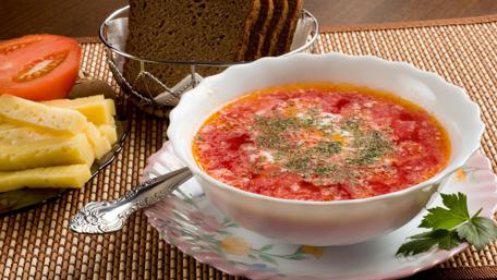 Delicious Tomato Soup with Fresh Ingredients wallpaper