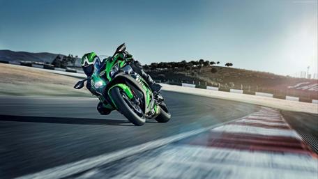Dynamic Motorcycle Racing Wallpaper for Enthusiasts wallpaper