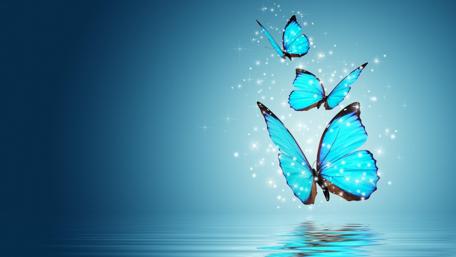 Neon Butterfly Dance Over Tranquil Waters wallpaper