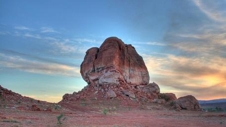 Majestic Rock Formation in Serene Landscape wallpaper