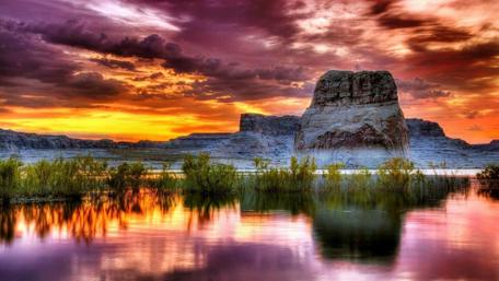 Purple and Orange Sunset Over Lake wallpaper