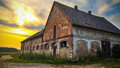 Timeless Serenity of a Rustic Cottage at Sunset wallpaper