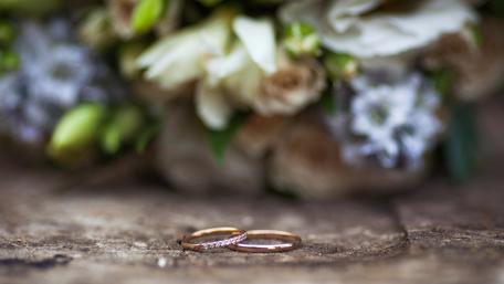 Whispers of Love in Golden Rings wallpaper