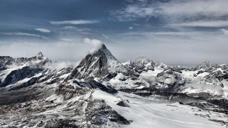 Majestic Snow-Capped Peaks in Serenity wallpaper