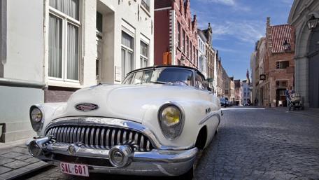 Vintage Beauty on a Cobblestone Street wallpaper