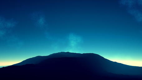 Majestic Mountain Silhouette Under a Starry Sky wallpaper