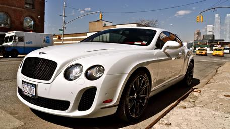 Sleek White Luxury Car Wallpaper wallpaper
