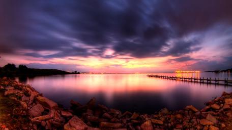 Tranquil Sunset Over the Pier on the Shore wallpaper