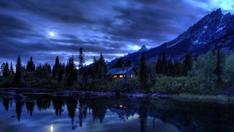 Serene Mountain Retreat Under a Starry Sky wallpaper