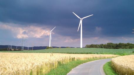 A Serene Wind Farm Landscape wallpaper