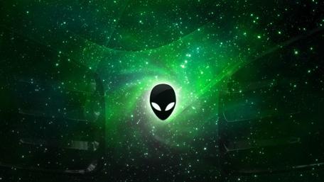 Alien in Cosmic Green Glow wallpaper