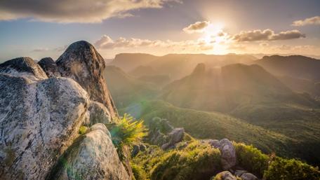 Majestic Sunset Over Mountain Range wallpaper