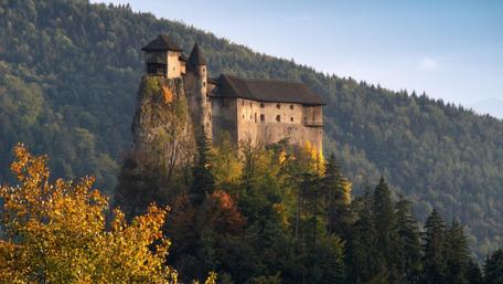 Majestic Castle Amidst Autumn Colors wallpaper