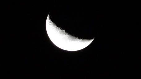 Title: Enchanting Crescent Moon in a Starry Night Sky wallpaper