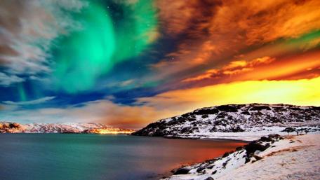 Northern Lights over Winter Landscape wallpaper