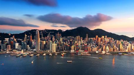 Title: Urban Symphony American Cityscape Meets Serene Sea wallpaper