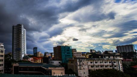 Dramatic Urban Landscape Under Rainy Skies wallpaper