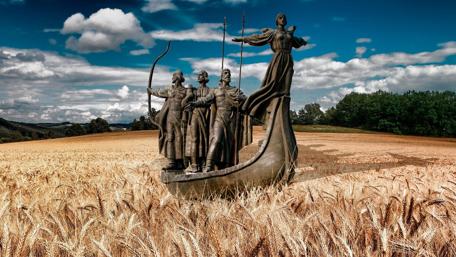 Statues in Enchanted Summer Fields wallpaper
