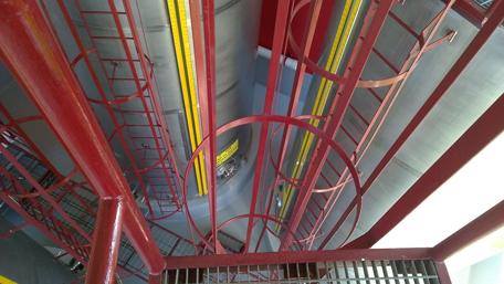 Industrial Spiral Staircase Perspective wallpaper