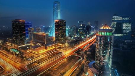 Nighttime Urban Symphony of Lights and Skyscrapers wallpaper