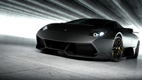 Sleek Black Dream Car Wallpaper wallpaper