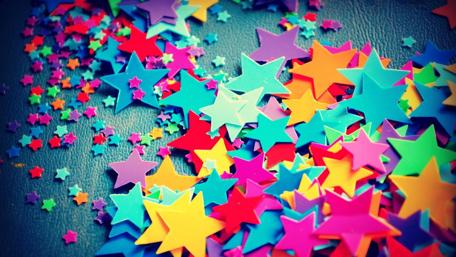 Colorful Star Confetti for Festive Cheer wallpaper