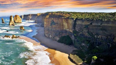Majestic Coastal Cliffs at Sunset wallpaper